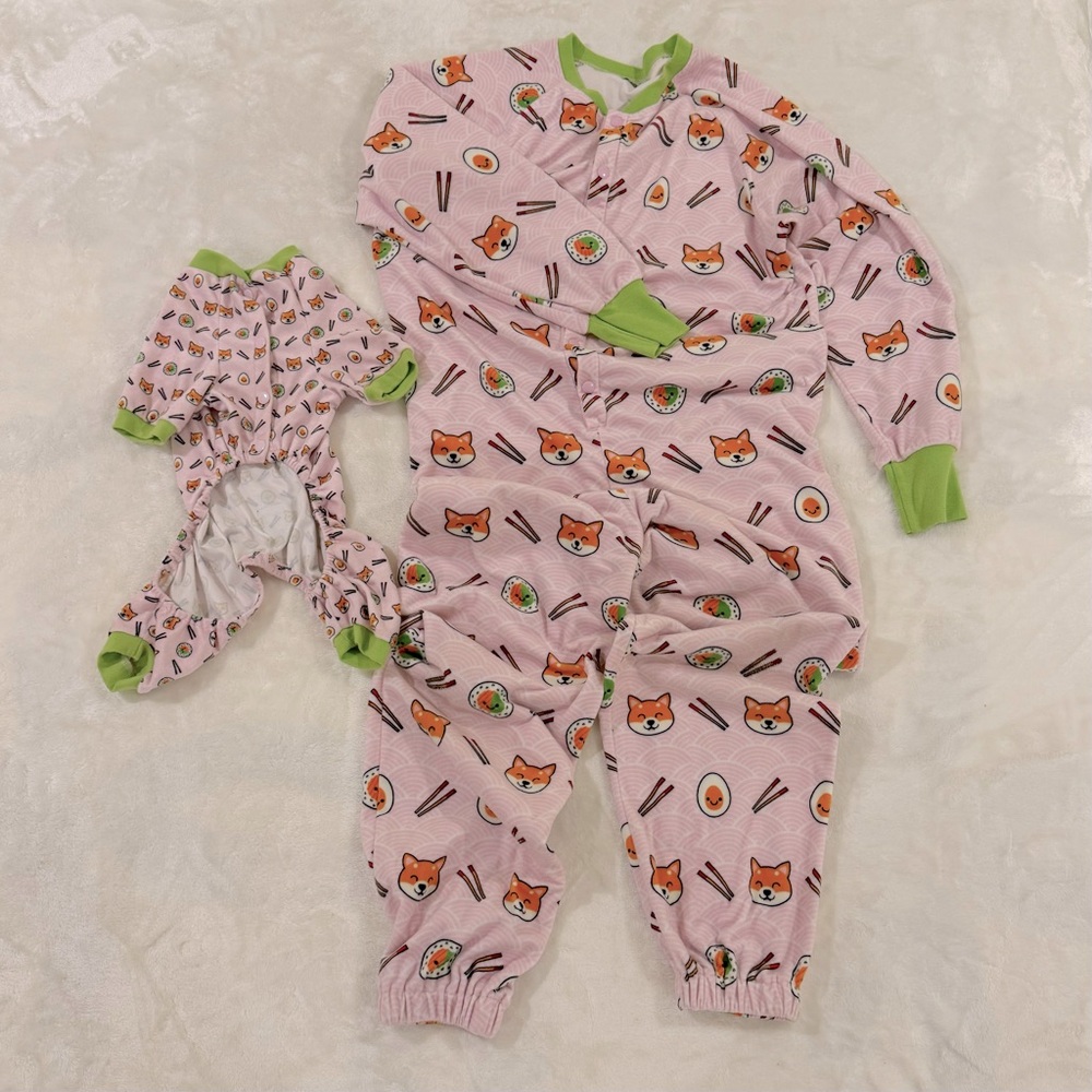 FuzzYard 2-set onesies for human and pet in pink Japanese Shiba Inu and sushi